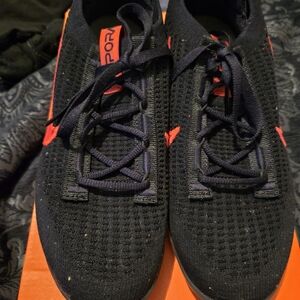 Black Knit Sneakers with Bright Red Accents